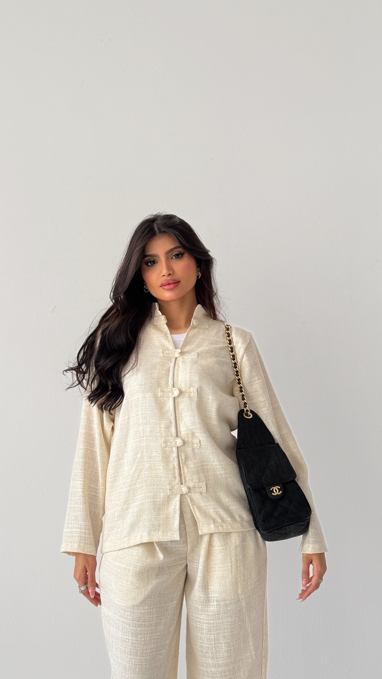 Off-white linen suit with buttons