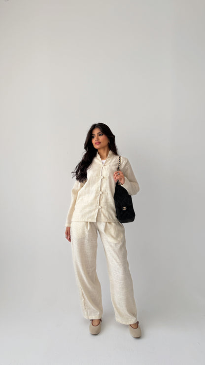 Off-white linen suit with buttons