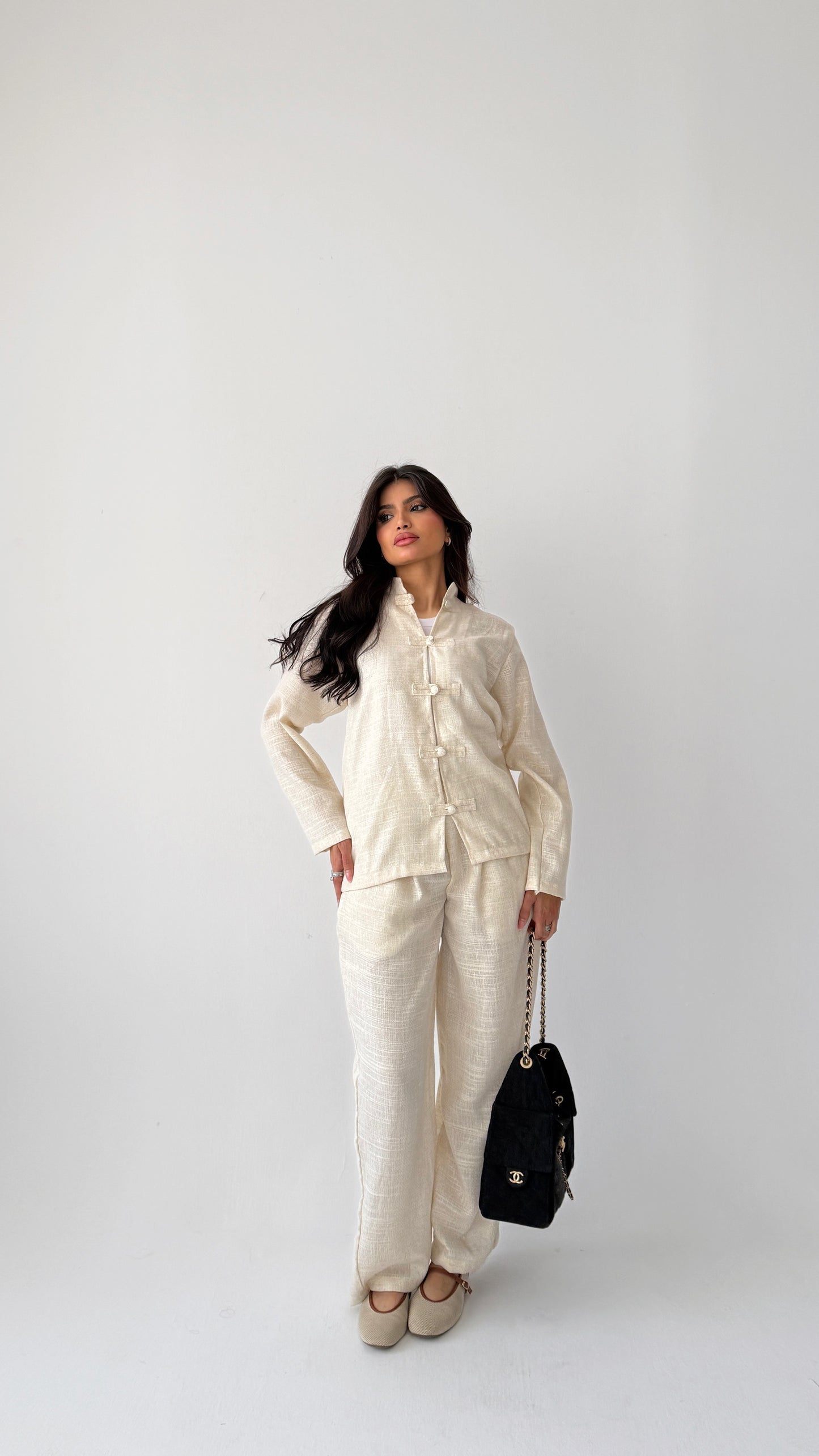 Off-white linen suit with buttons