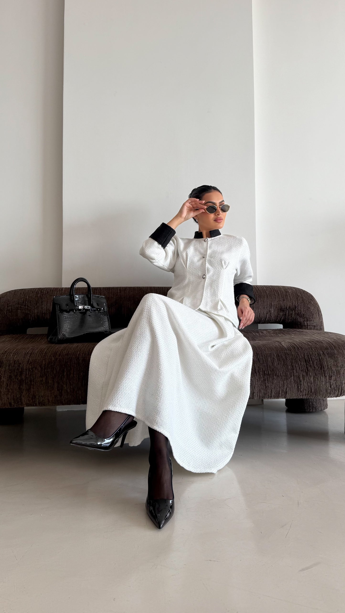 Classic white tweed suit