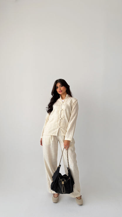 Off-white linen suit with buttons