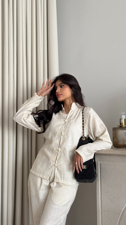 Off-white linen suit with buttons